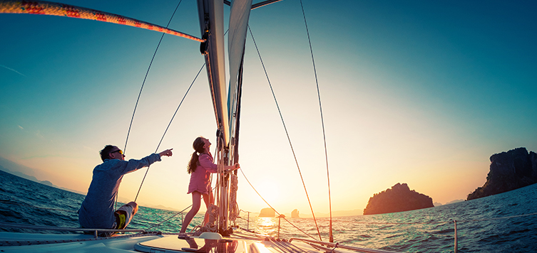 Couple sailing in the tropical sea